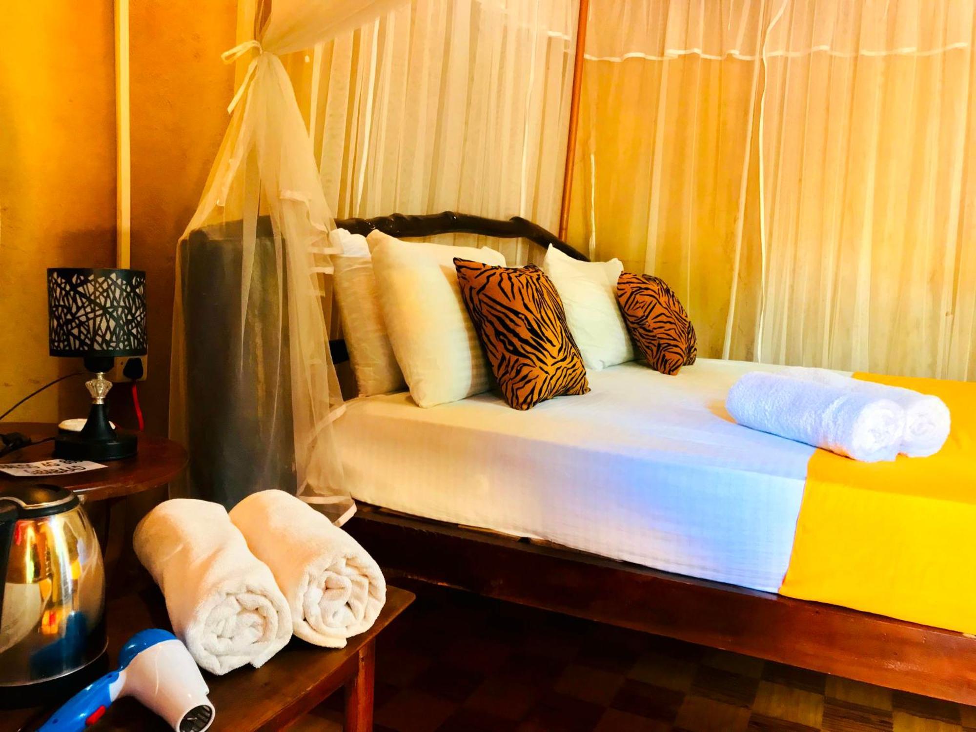 Atha Safari Resort & Riverside Camping อุดาวาลาเว ภายนอก รูปภาพ